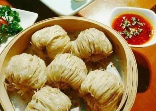 陜西十大美食排行榜,肉夾饃爽而不膩、陜西涼皮口感十足