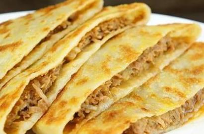 內(nèi)蒙古十大有名小吃 烤羊腿是內(nèi)蒙古招待客人的上等佳肴